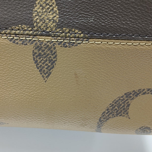 ONTHEGO MM Monogram Coated Canvas Brown