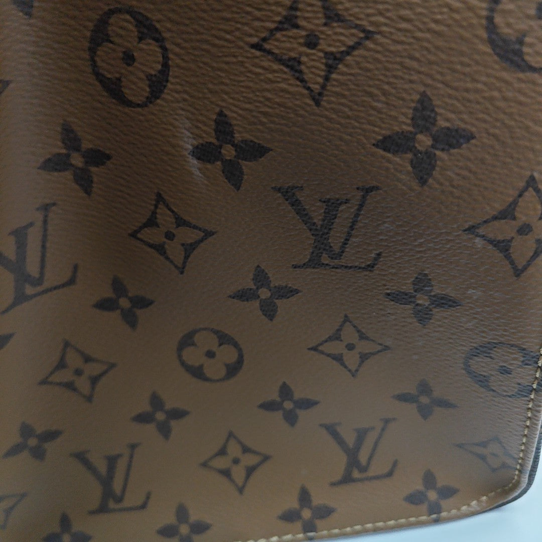 ONTHEGO GM Monogram Coated Canvas Brown