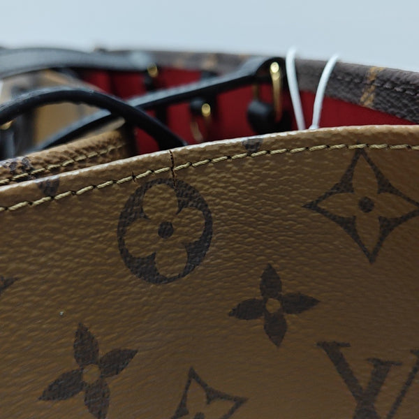 ONTHEGO MM Monogram Coated Canvas Brown