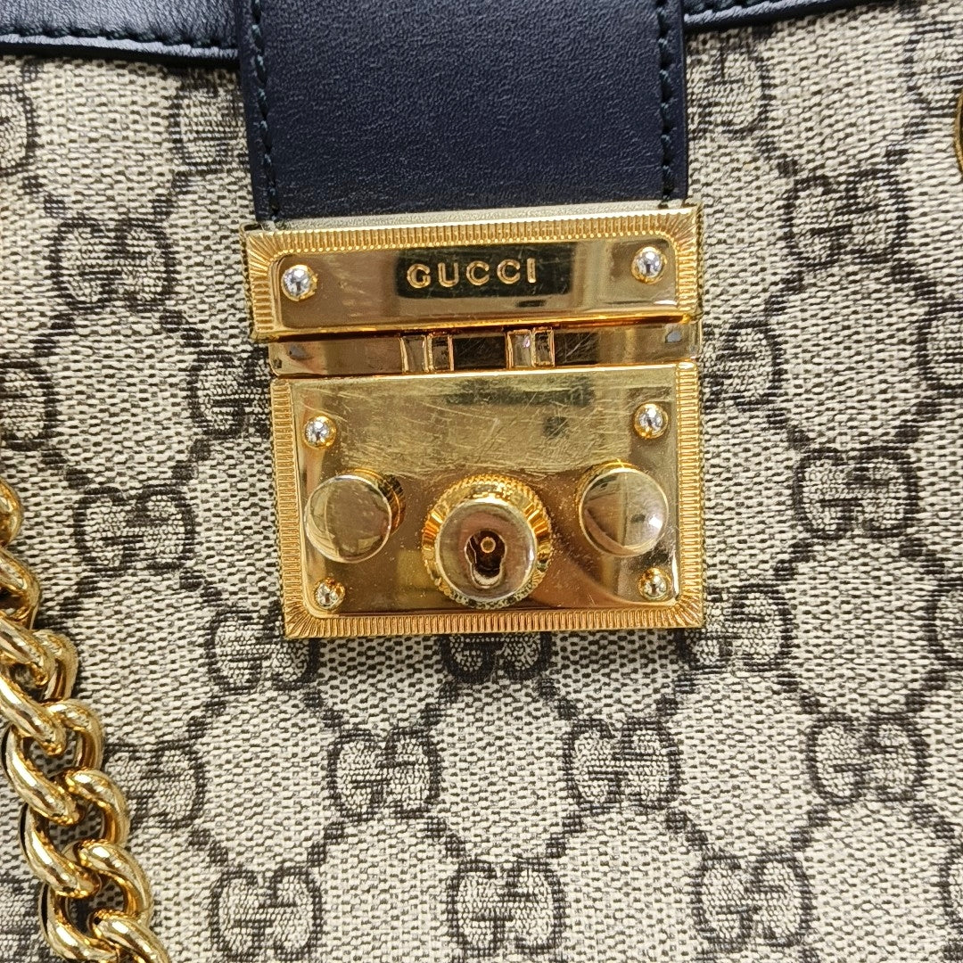 Padlock Small Monogram Coated Canvas Beige