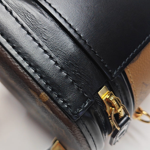 CANNES PM Monogram Coated Canvas Brown