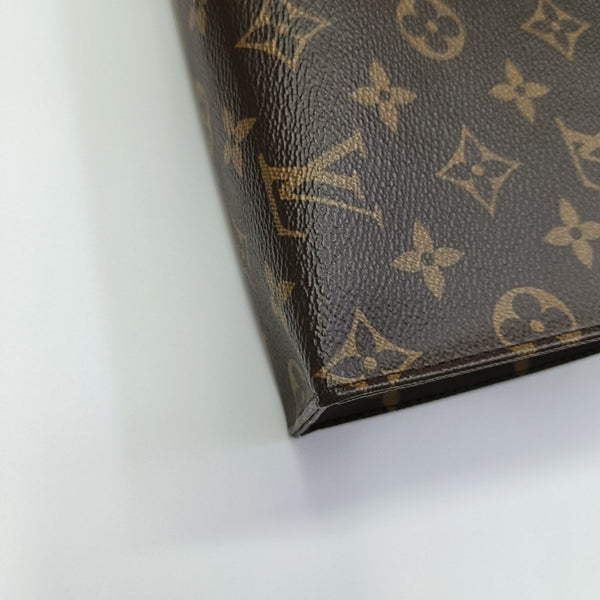 TOILET POCKET 26 Monogram Coated Canvas Brown