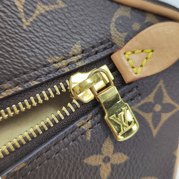 JUST IN CASE Monogram Coated Canvas Brown