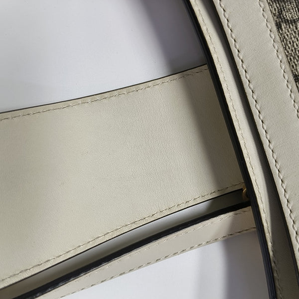Padlock Small Monogram Coated Canvas Beige