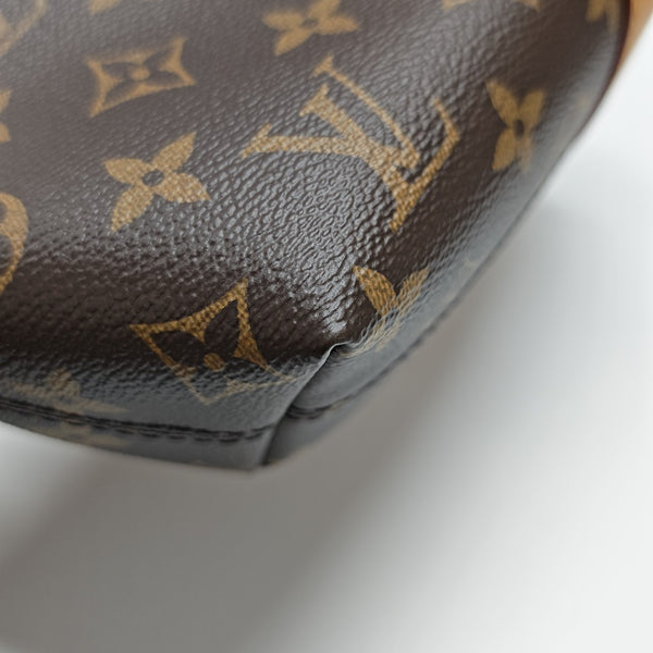Pochette Mia Monogram Coated Canvas Brown