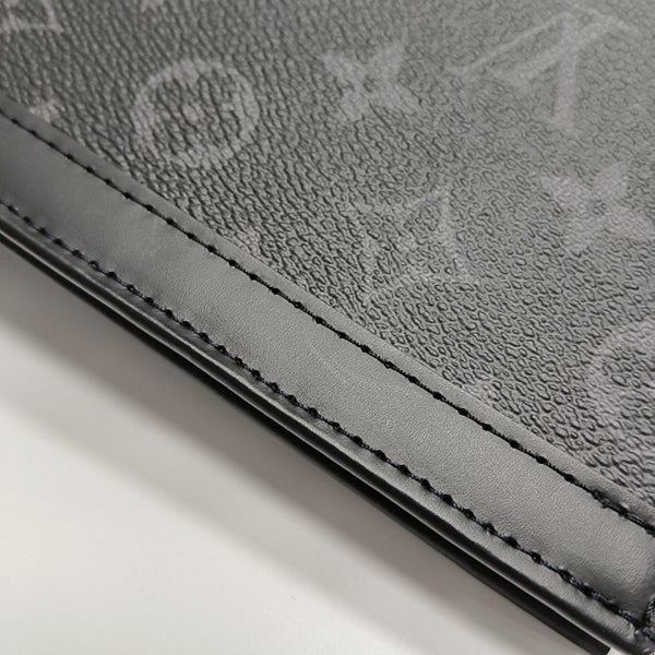 Pochette Voyag MM Monogram Coated Canvas Black