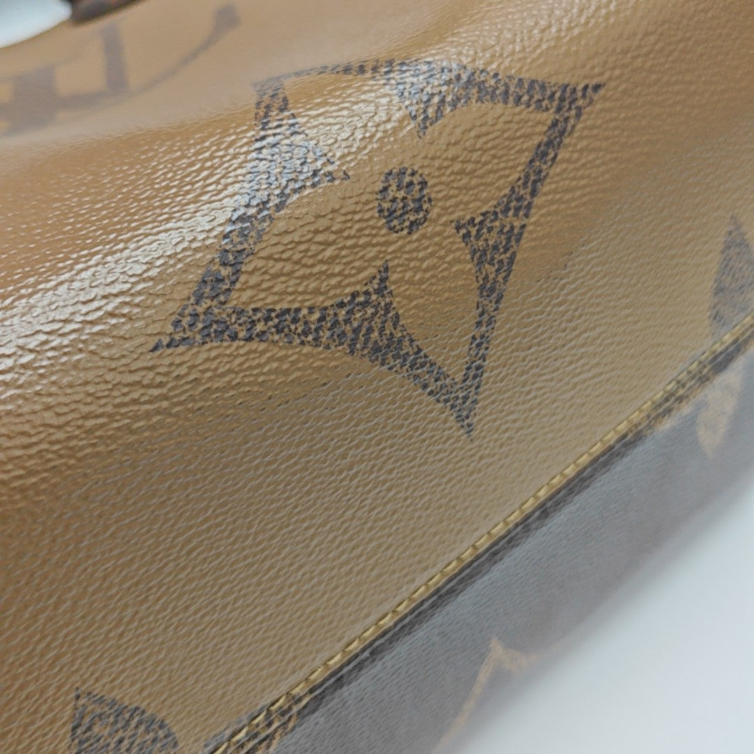 ONTHEGO MM Monogram Coated Canvas Brown