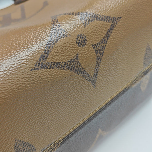 ONTHEGO MM Monogram Coated Canvas Brown