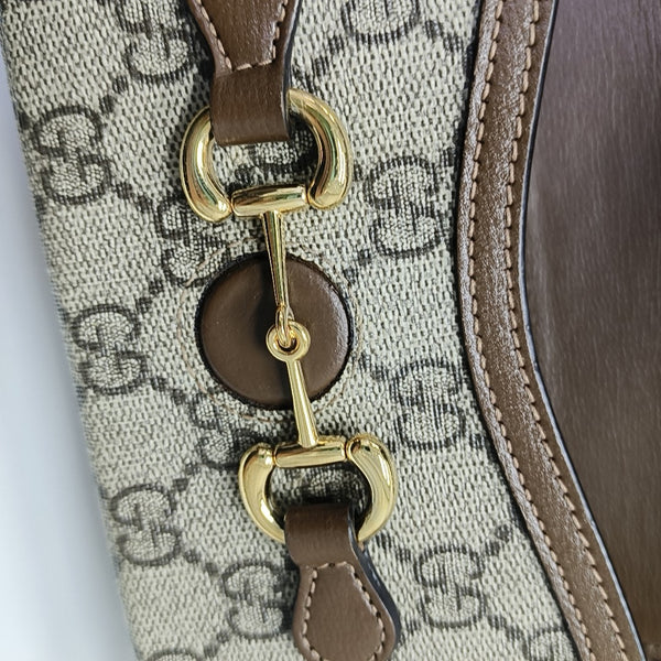 Authenticated pre-owned  Horsebit 1955 Mini Monogram Coated Canvas Beige - Shoulder Bag at Looply