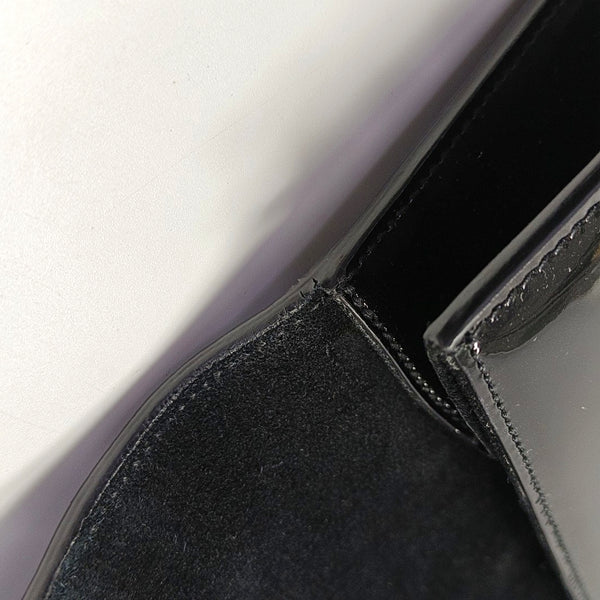 Authenticated pre-owned  KATE Small Patent Leather Black - Clutch at Looply