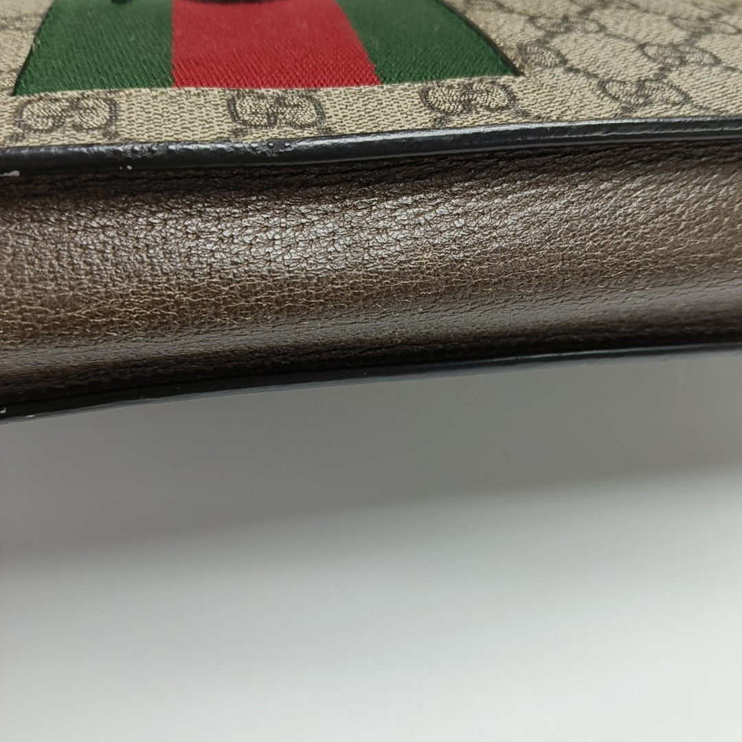 GG Supreme Monogram Coated Canvas Brown