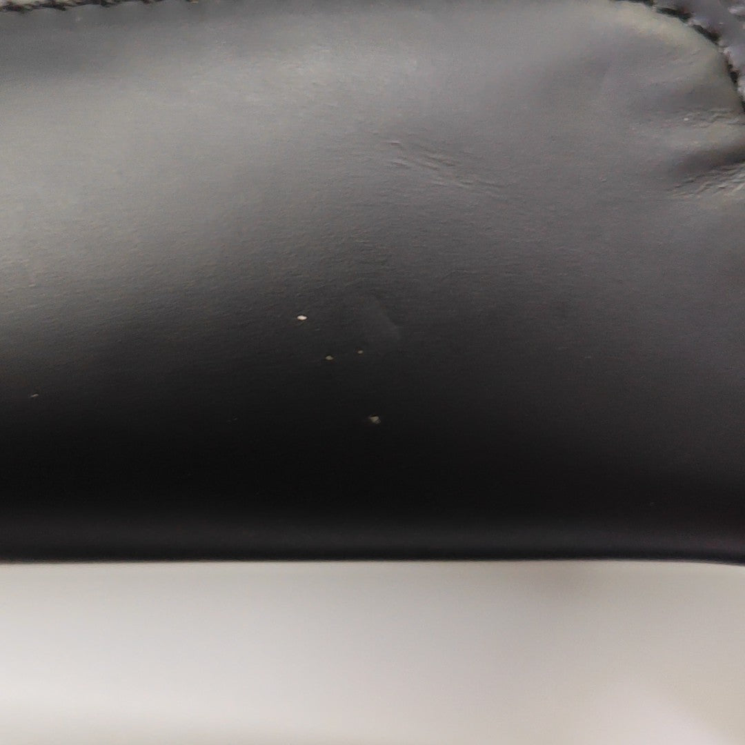 VOYAGER PM Monogram Coated Canvas Black