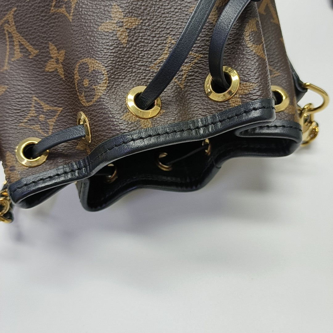 CANOÉ Monogram Coated Canvas Brown