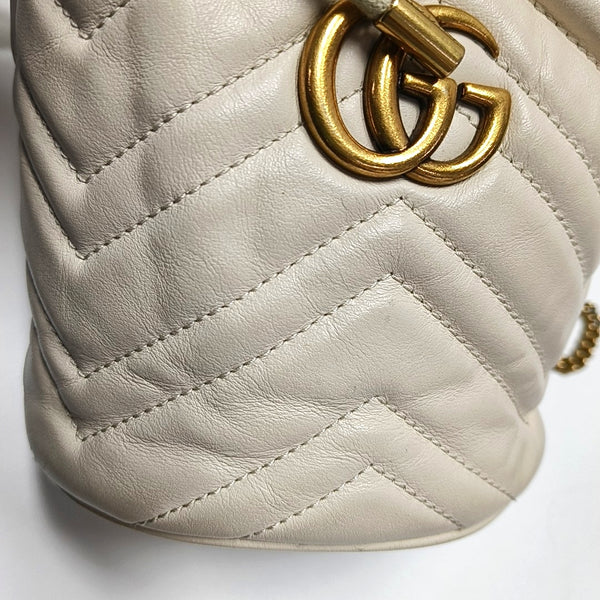 Authenticated pre-owned  GG Marmont Mini Quilted Calfskin White - Bucket Bag at Looply