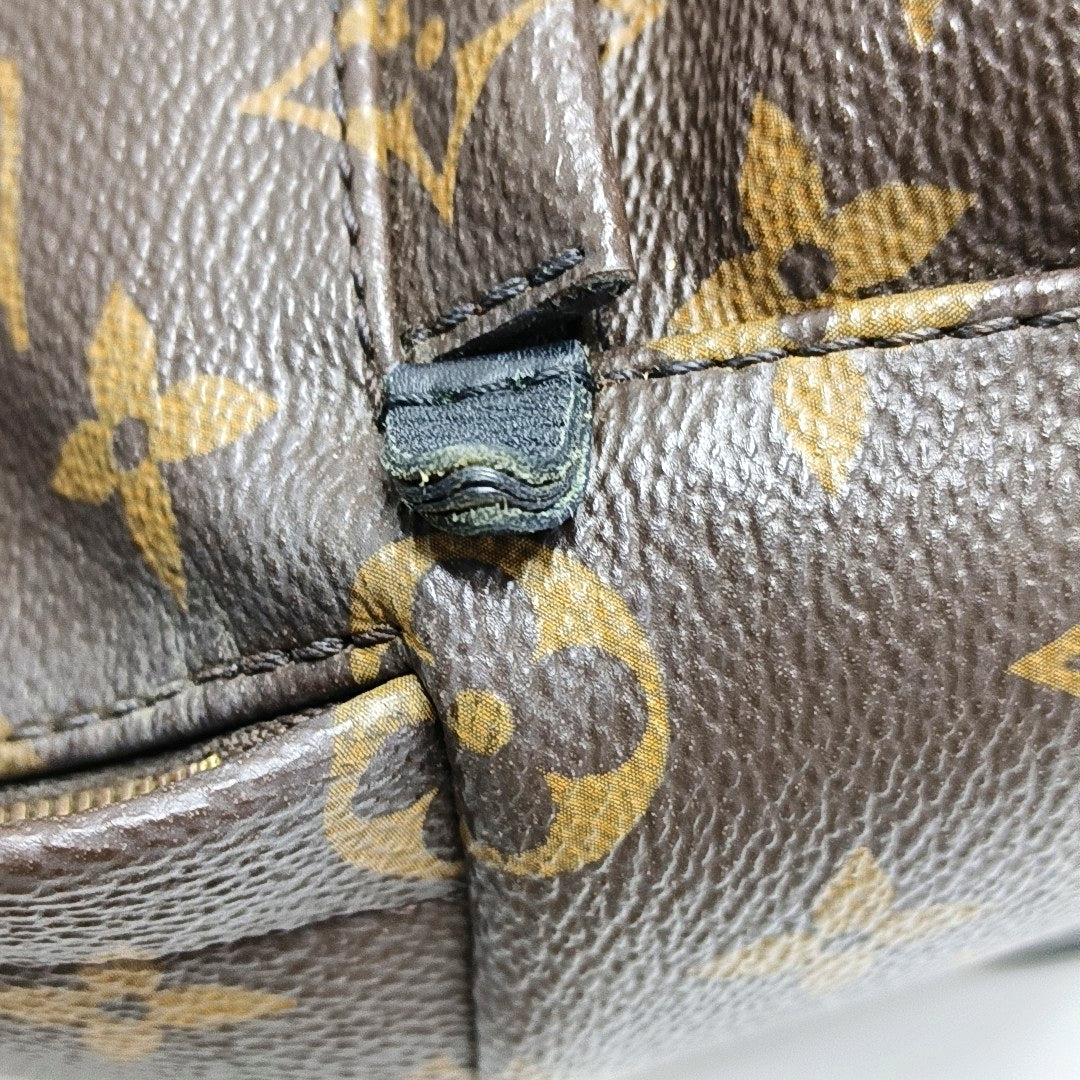 Authenticated pre-owned  PALM SPRINGS Mini Monogram Coated Canvas Brown - Backpack at Looply