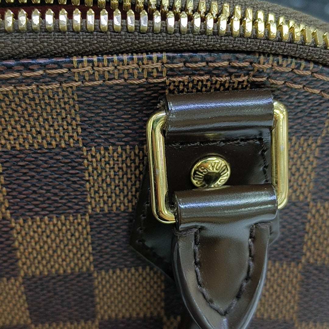 ALMA BB Damier Ebene Coated Canvas Brown