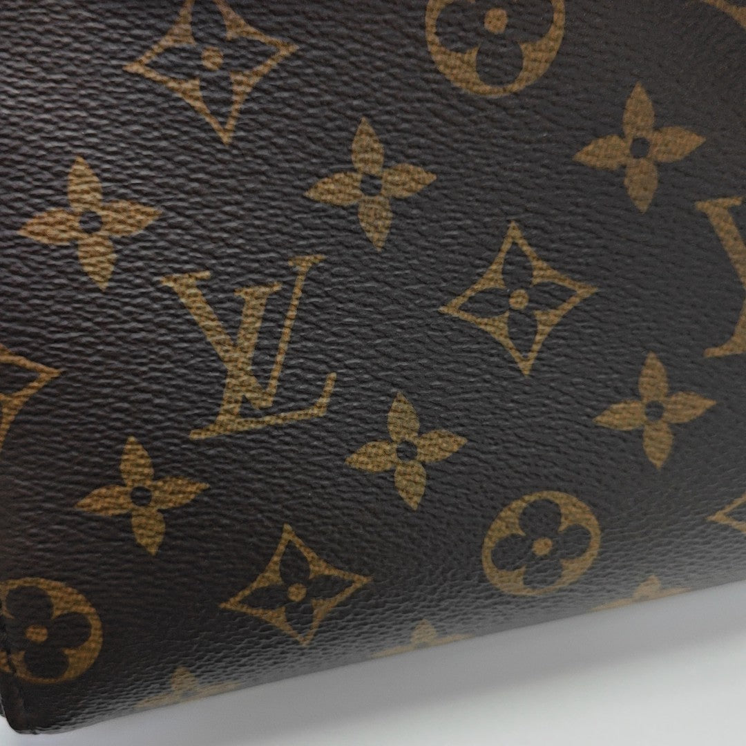 VÉNUS Monogram Coated Canvas Brown