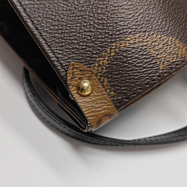 ONTHEGO MM Monogram Coated Canvas Brown