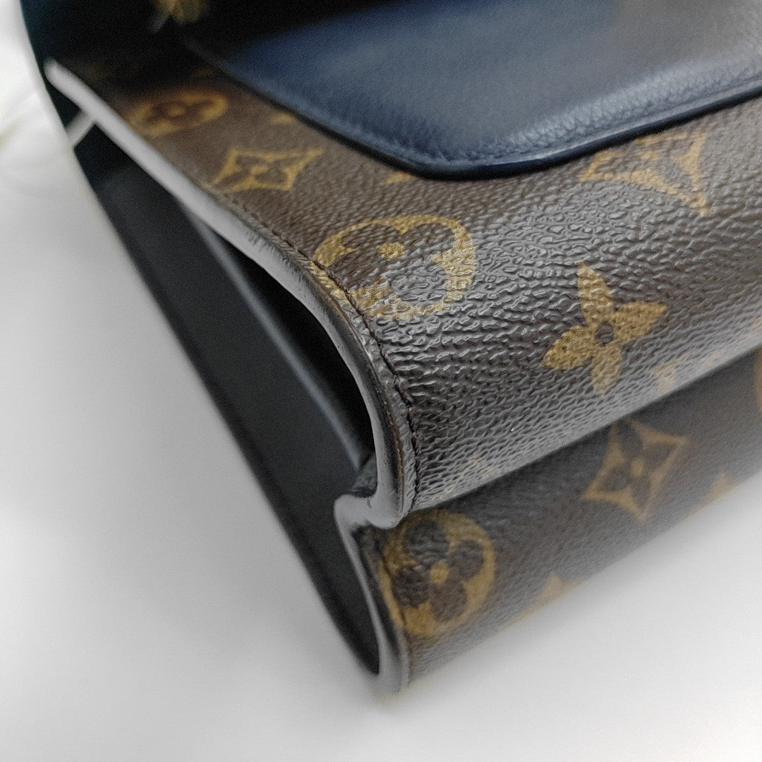 VICTOIRE Monogram Coated Canvas Brown