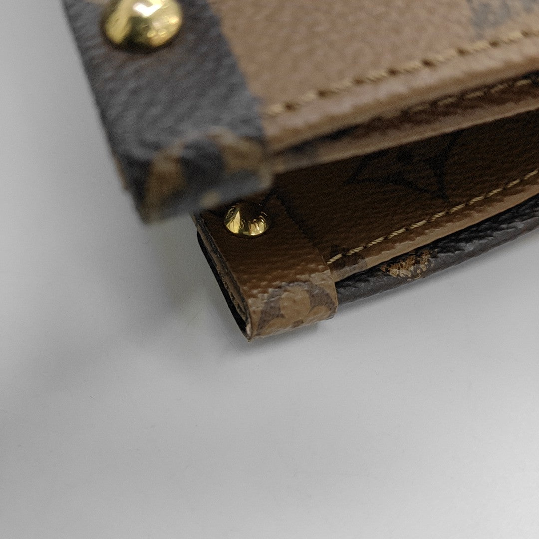 ONTHEGO MM Monogram Coated Canvas Brown