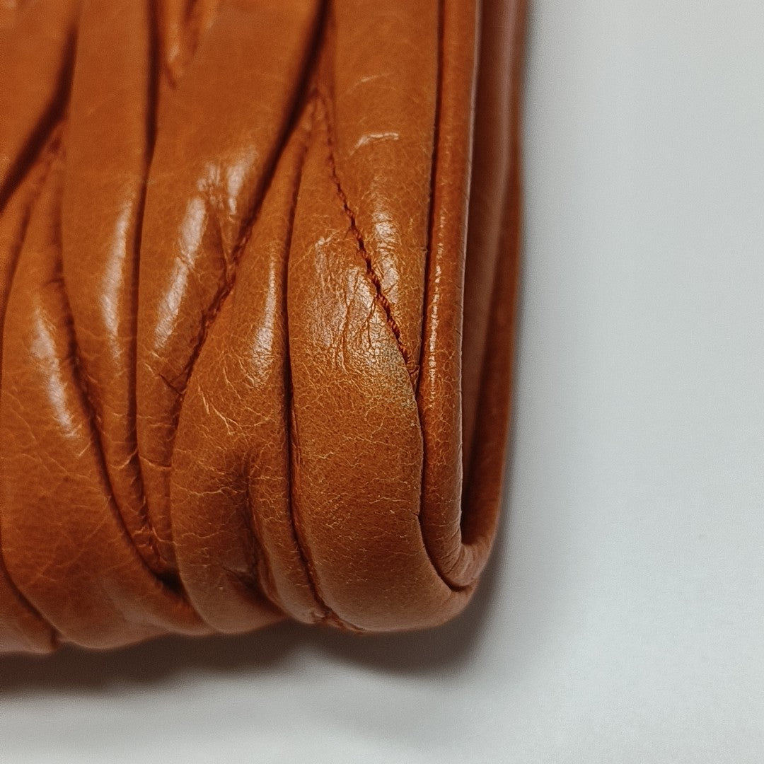 Quilted Lambskin Clutch Orange