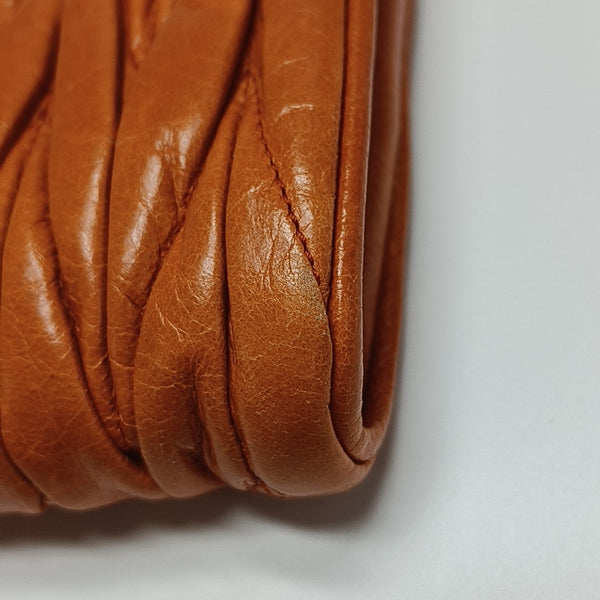 Quilted Lambskin Clutch Orange
