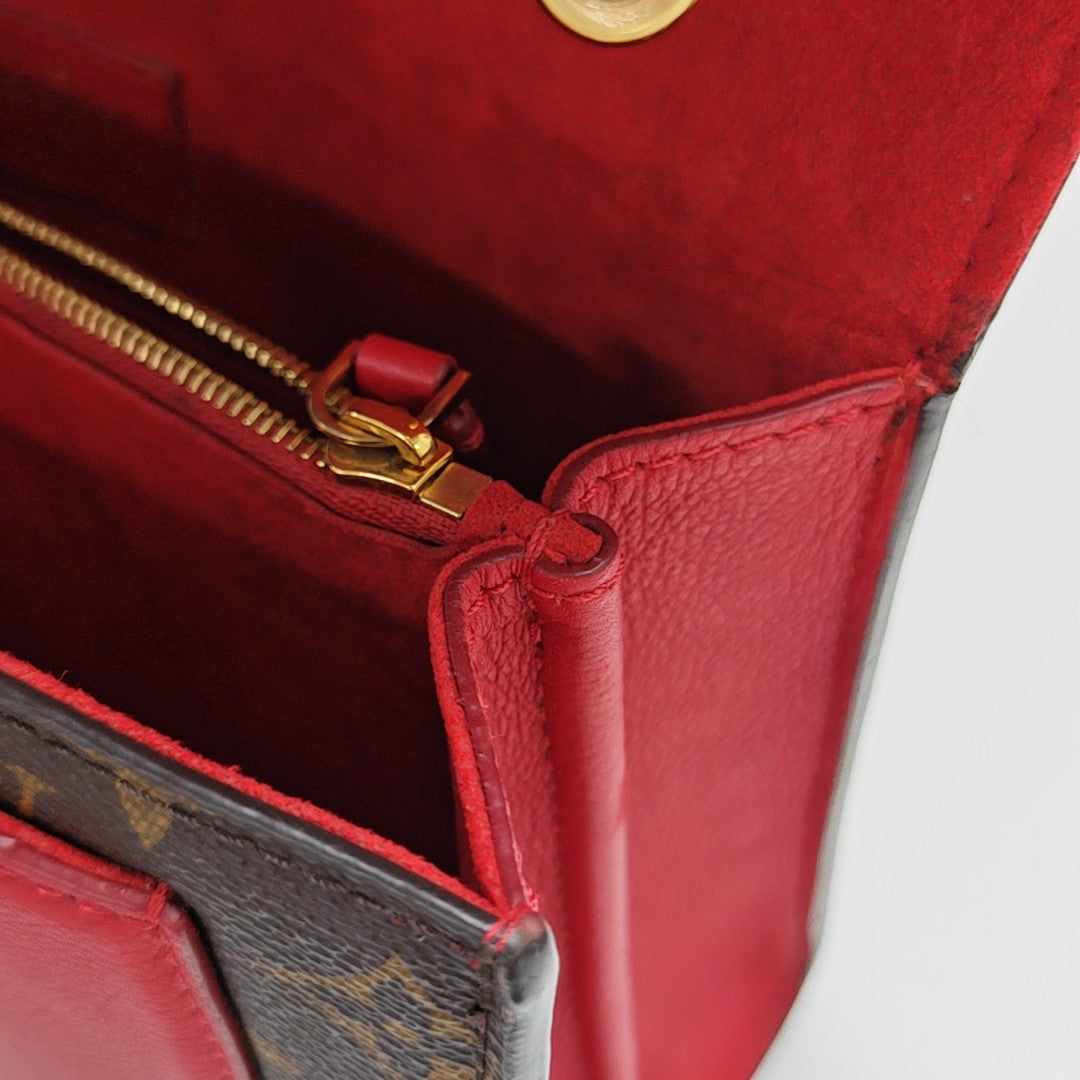 VICTOIRE Monogram Coated Canvas Brown