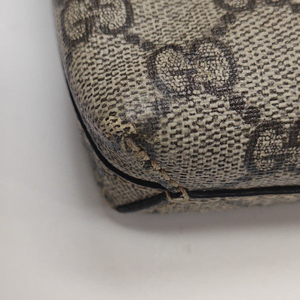 Monogram Coated Canvas Clutch Brown