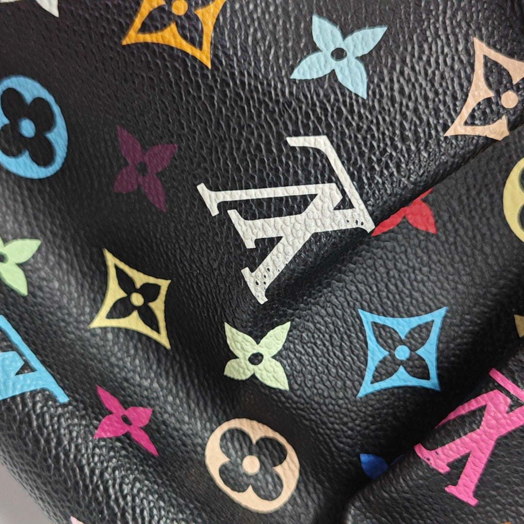 LV × TM URSULA Monogram Coated Canvas Black