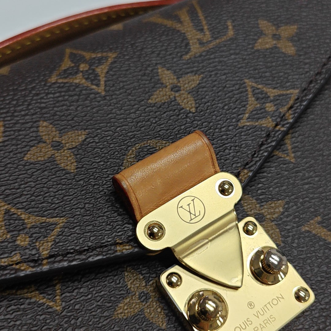 MÉTIS EAST WEST Monogram Coated Canvas Brown