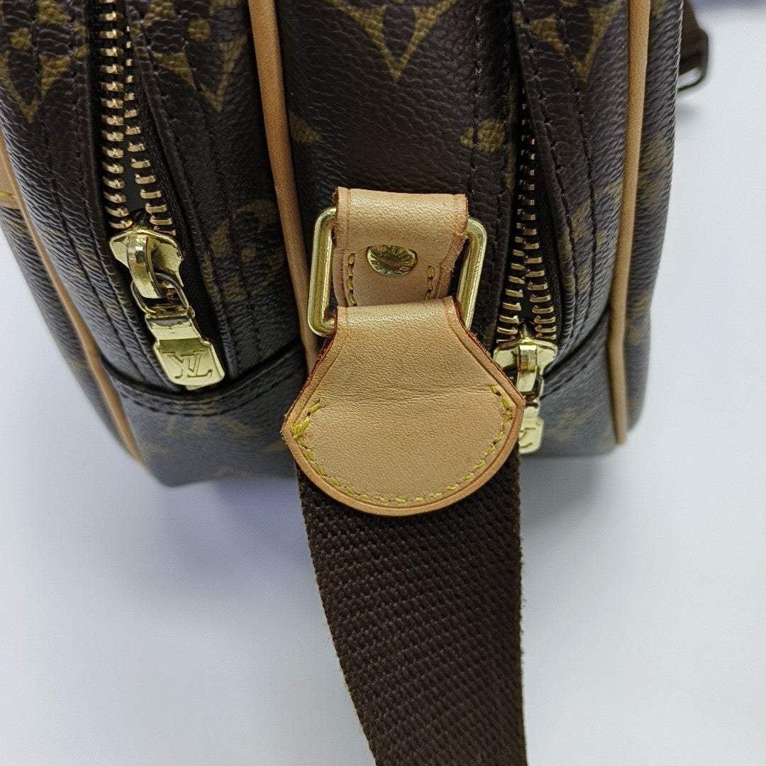 REPORTER PM Monogram Coated Canvas Brown
