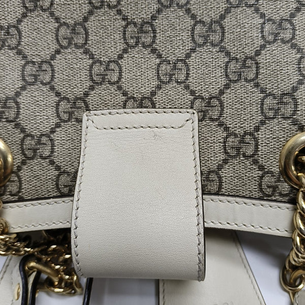 Padlock Small Monogram Coated Canvas Beige