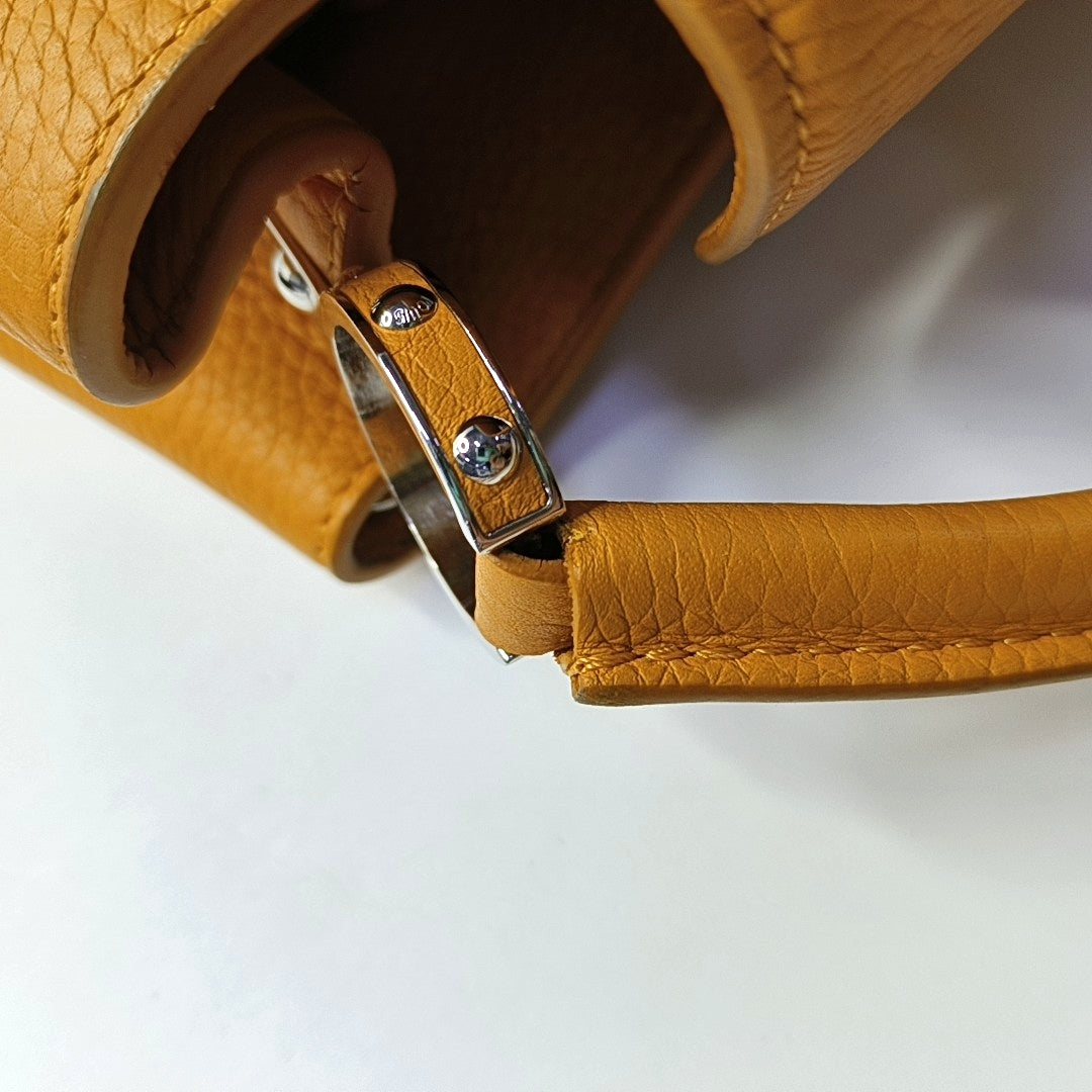 Authenticated pre-owned  CAPUCINES BB Calfskin Orange - Shoulder Bag at Looply