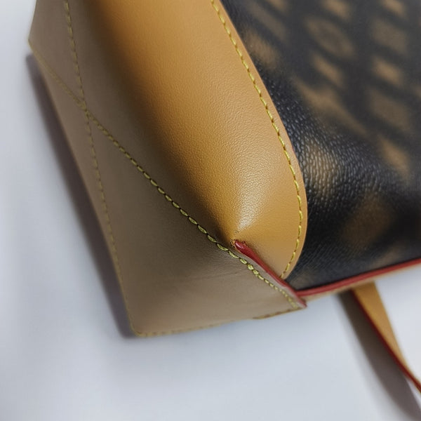 CRUISER Monogram Coated Canvas Brown