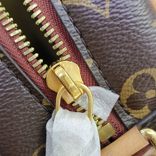 BOITE CHAPEAU PM Monogram Coated Canvas Brown