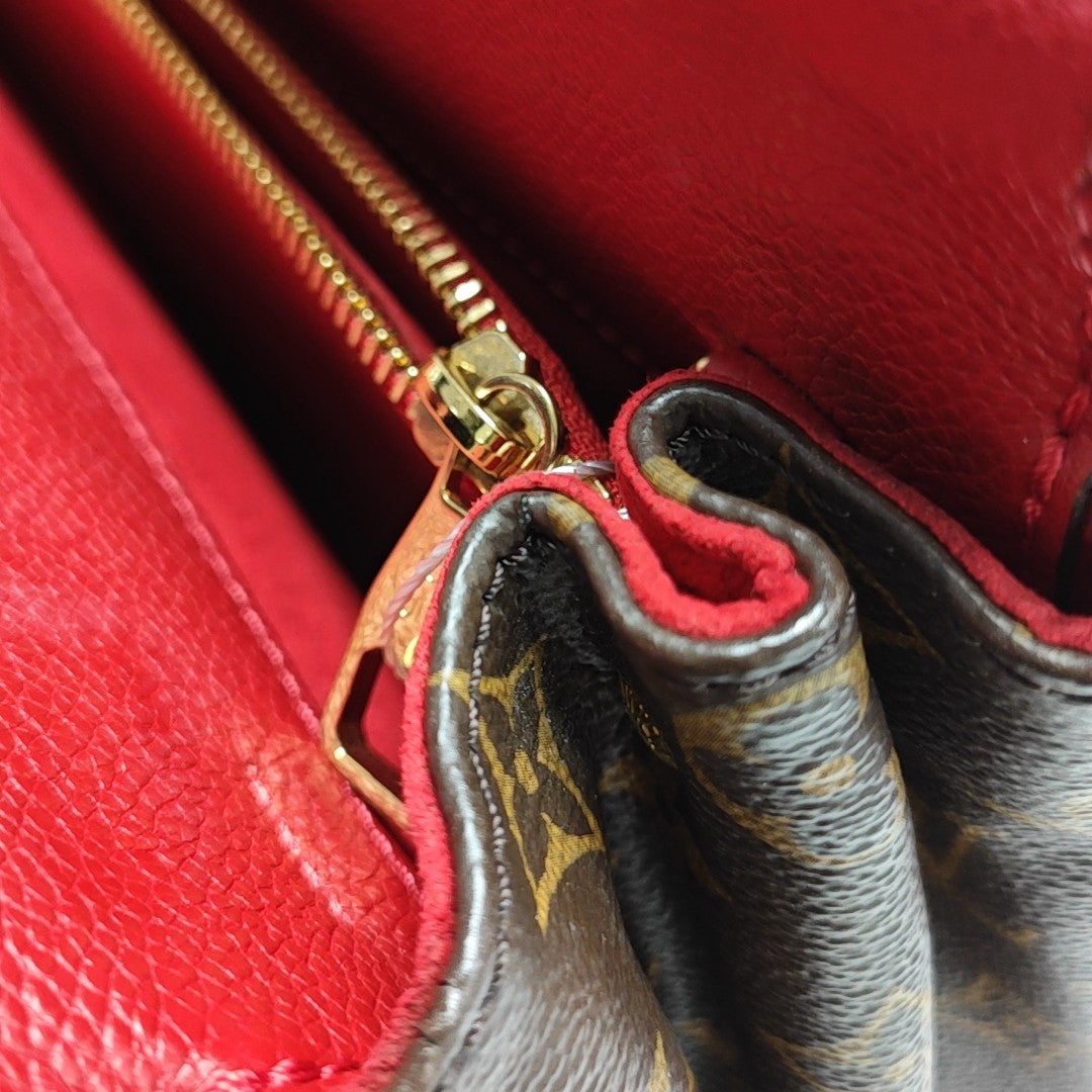 VÉNUS Monogram Coated Canvas Brown