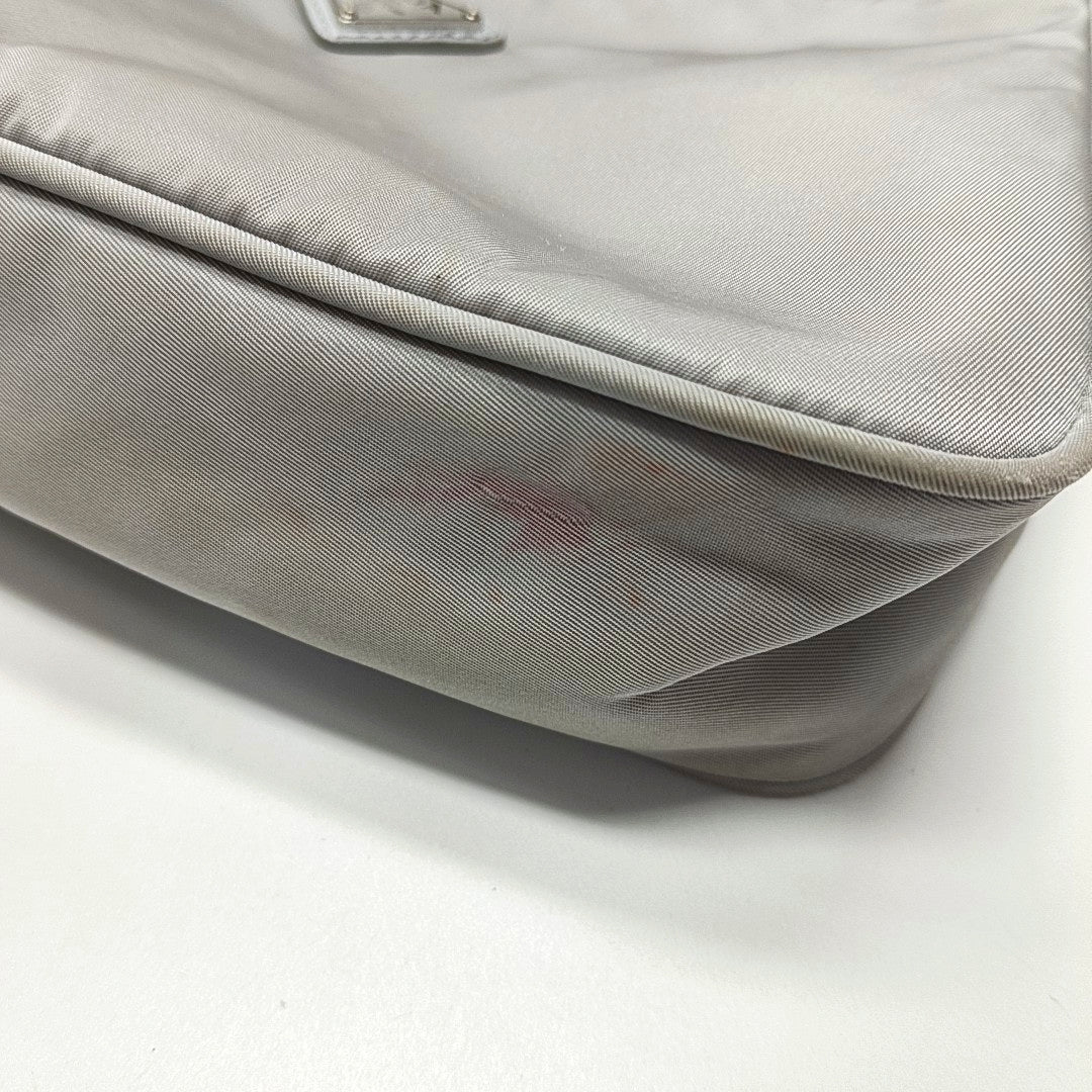 Authenticated pre-owned  Re-Edition2000 Mini Nylon Gray - Top Handle Bag at Looply