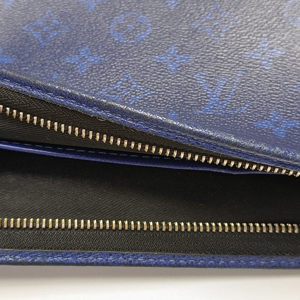 Pochette Voyag MM Monogram Coated Canvas Blue