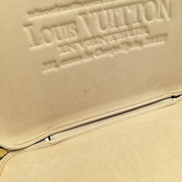 Monogram Coated Canvas Clutch Brown