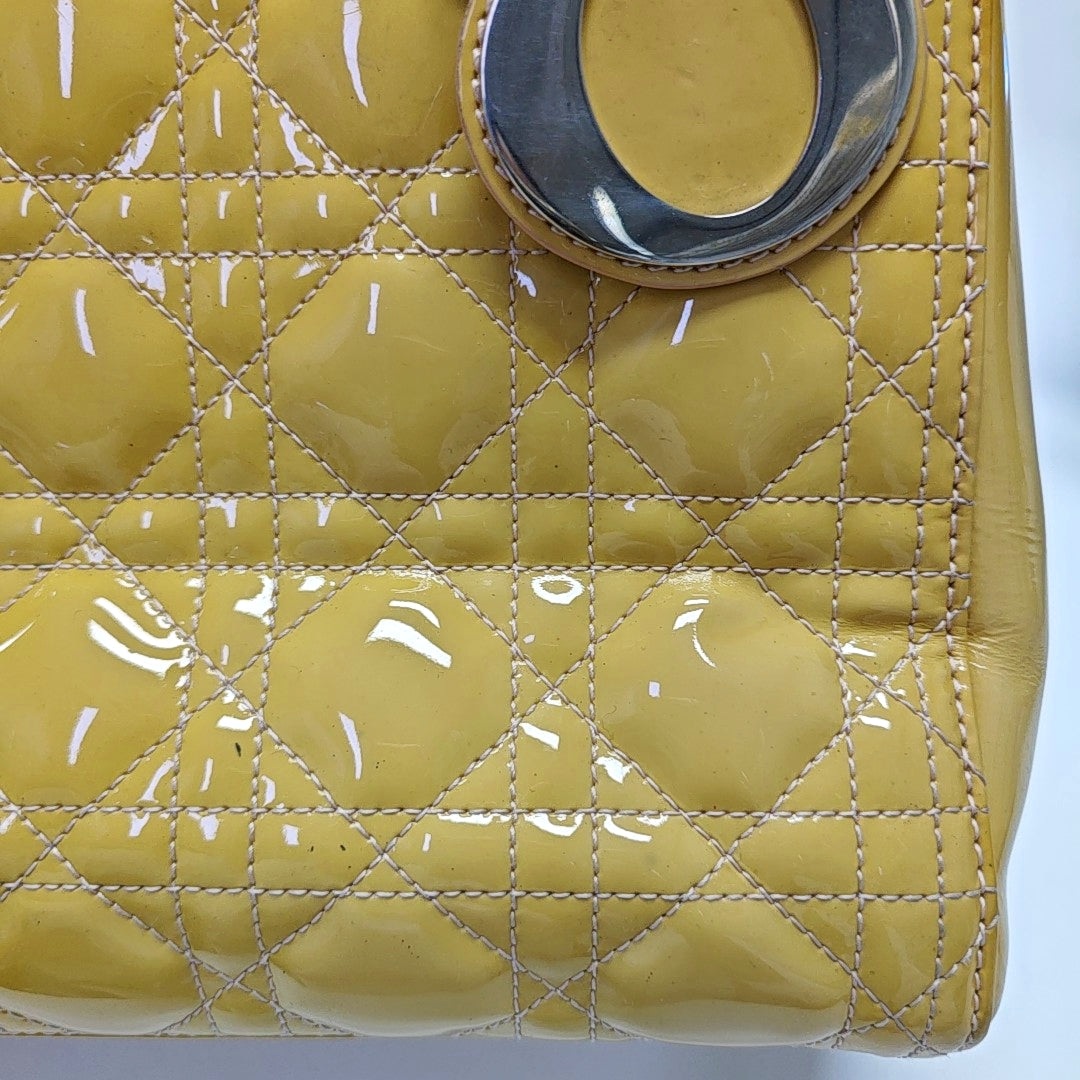 Authenticated pre-owned  Lady Dior Medium Quilted Patent Leather Yellow - Tote Bag at Looply