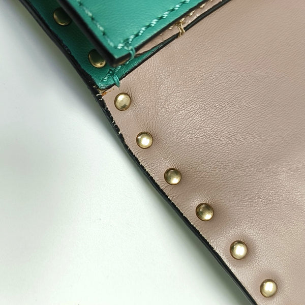 Authenticated pre-owned  Rockstud Lambskin Green - Clutch at Looply