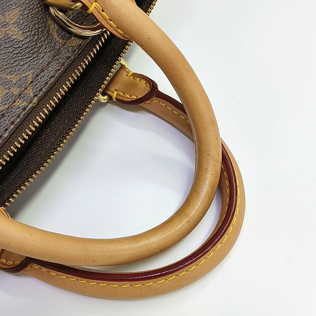 Authenticated pre-owned  SPEEDY 25 Monogram Coated Canvas Brown - Shoulder Bag at Looply