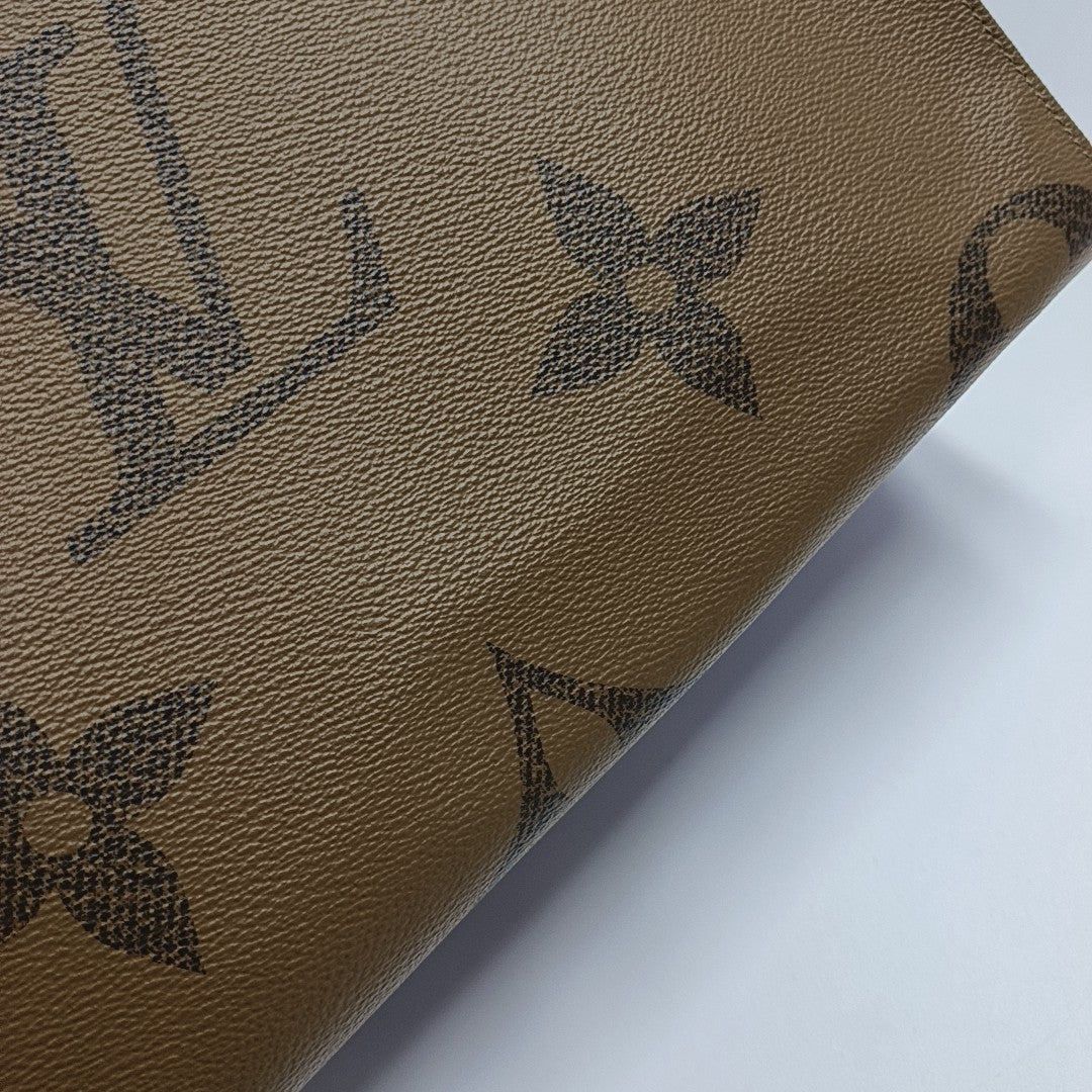 ONTHEGO MM Monogram Coated Canvas Brown