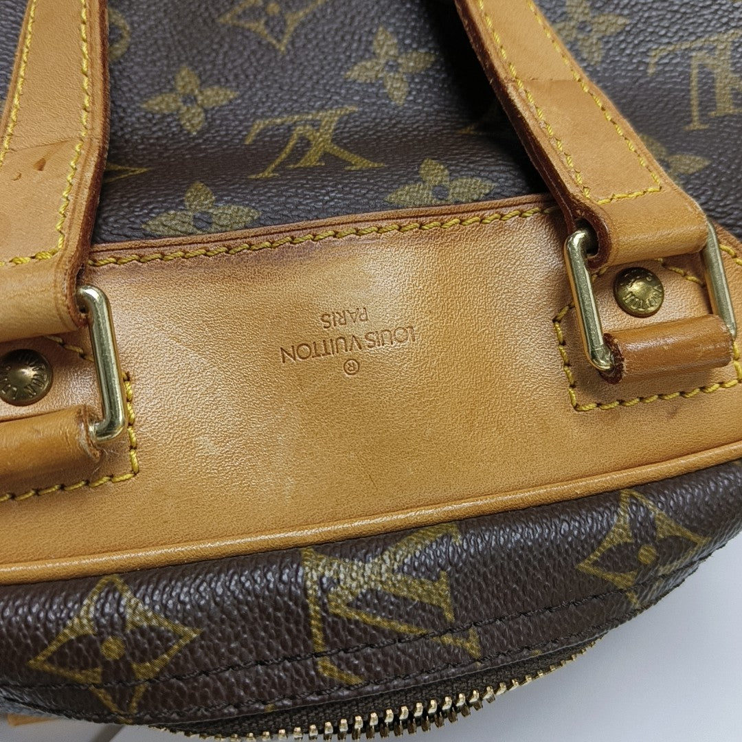 EXCURSION Monogram Coated Canvas Brown