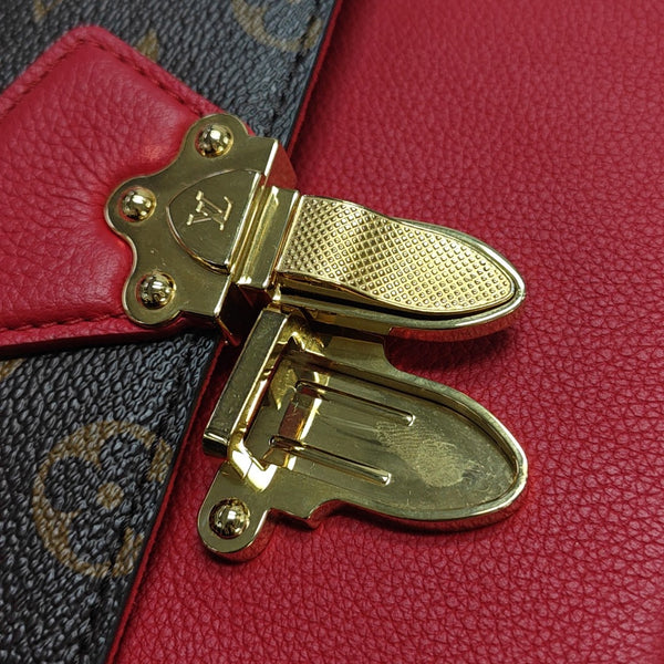 VICTOIRE Monogram Coated Canvas Brown