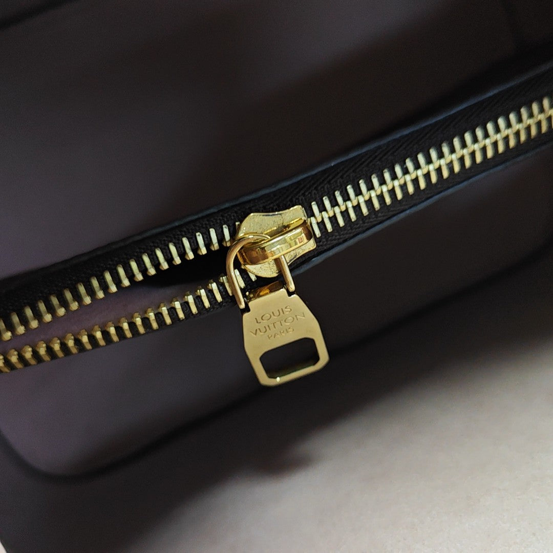 NÉONOÉ MM Monogram Coated Canvas Brown