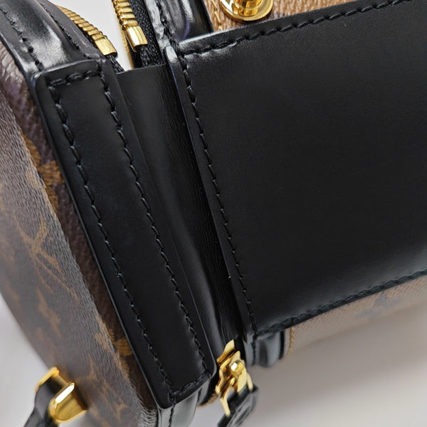 CANNES PM Monogram Coated Canvas Brown