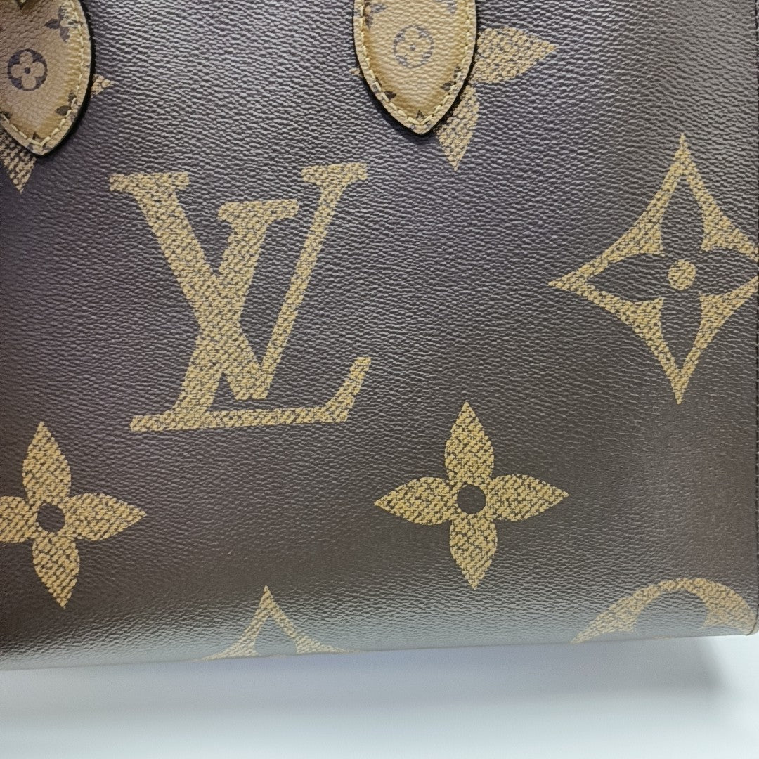 ONTHEGO MM Monogram Coated Canvas Brown