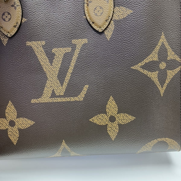 ONTHEGO MM Monogram Coated Canvas Brown
