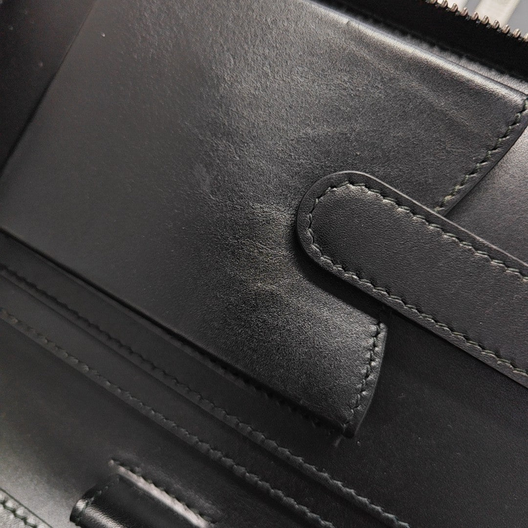 Monogram Coated Canvas Clutch Black